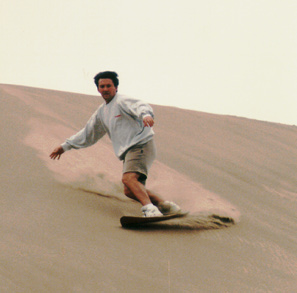 Jack Smith going down a dune.